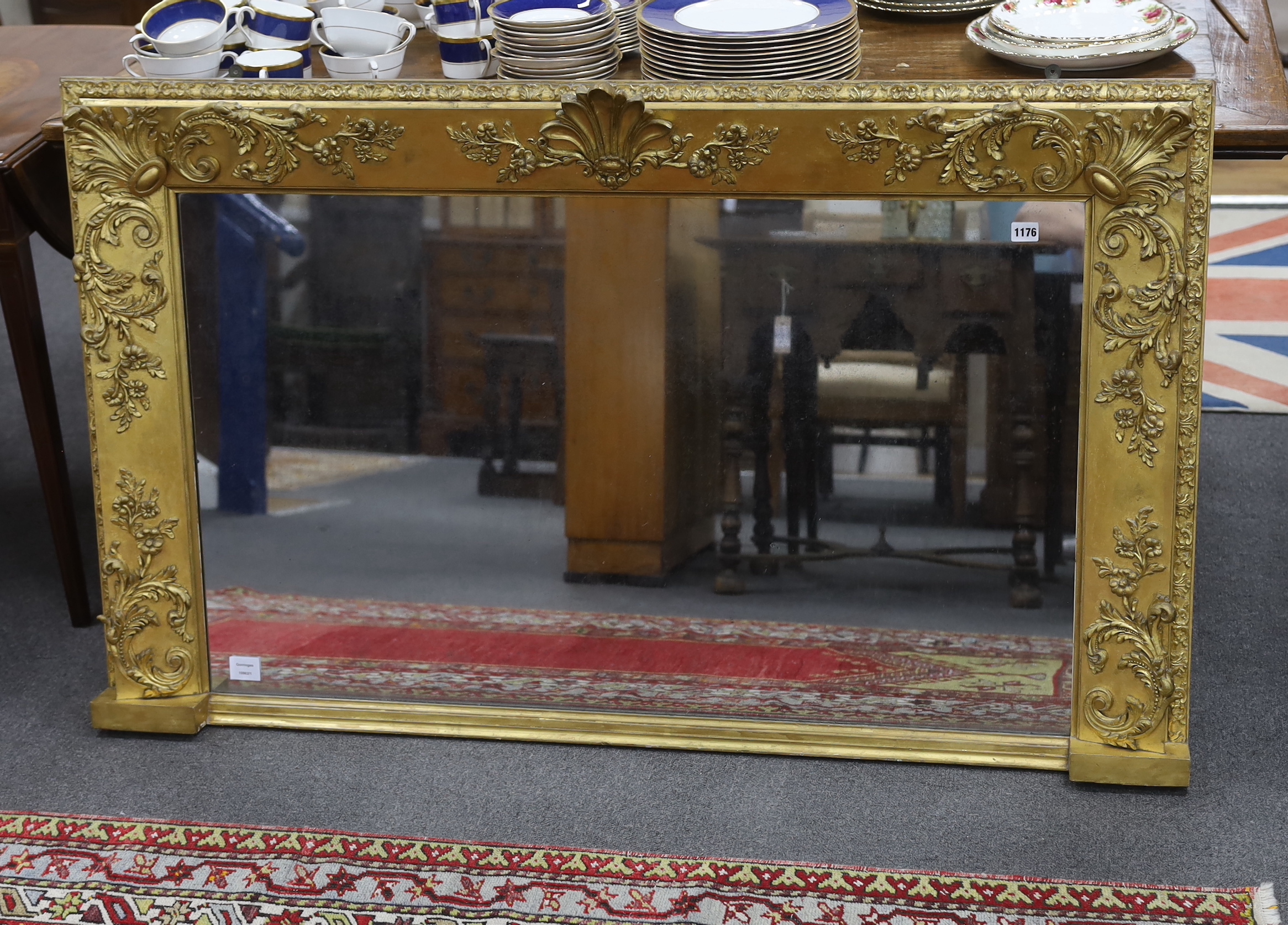 A Victorian giltwood and composition overmantel mirror width 139cm, height 83cm.